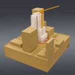 View of an engineering scale model with interchangable parts showing various stages of construction of a building deploying an integrated crane