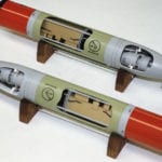 Full view of two engineering scale models of a Honeywell torpedoes