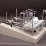 A full view of an engineering scale model of the floating Morse Lake pump platform