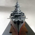 A detail view at the bow of the engineering scale model of the French battleship Richelieu, showing the twin turrets of three 15-inch guns.