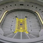 Interior view of the architectural scale model of Chase Center basketball arena, home of the Golden State Warriors, showing luxury seating section lighting features