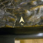 Close up of Kings Canyon cast bronze terrain model showing North arrow